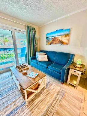 Sun Splashed Condo! Steps to Beach and 2 Pools